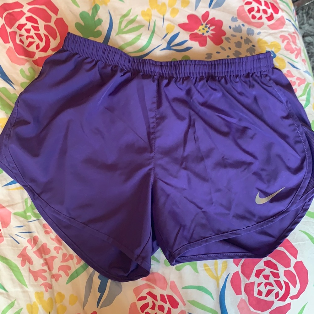 Purple Nike running shorts